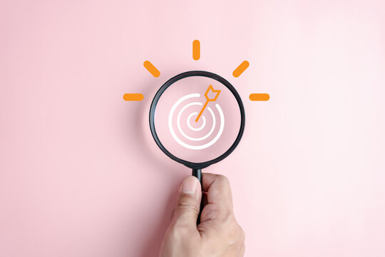 Magnifier glass focus to target objective with idea creative light bulb icon. planning development leadership and customer target group concept.