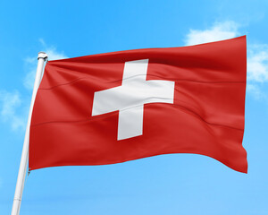 Switzerland flag fluttering in the wind on sky.