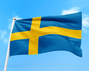 Sweden flag fluttering in the wind on sky.