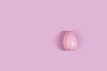 Easter egg on a pink background
