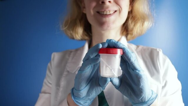 Medical test, doctor with donation jar, Donor sperm, fertility checkup, spermatozoa examination, health assessment