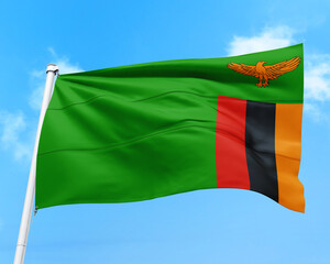 Zambia flag fluttering in the wind on sky.