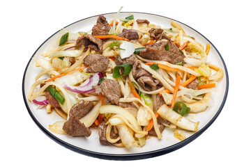 Vietnamese cuisine and food, udon noodles with vegetables and beef on a plate, on a white isolated background