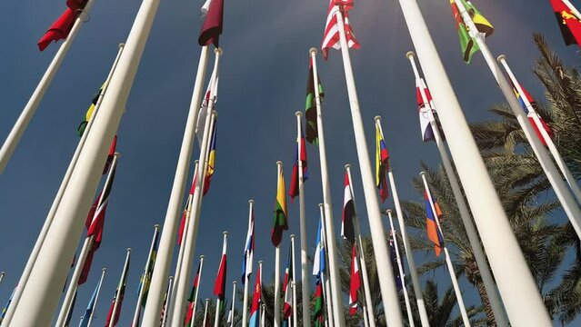 flags of the world, Flags of different countries at the background of blue sky. High quality 4k footage