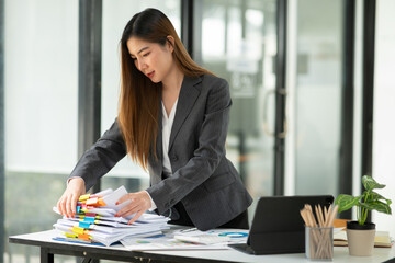 Businesswoman talking to customers online together at the office.