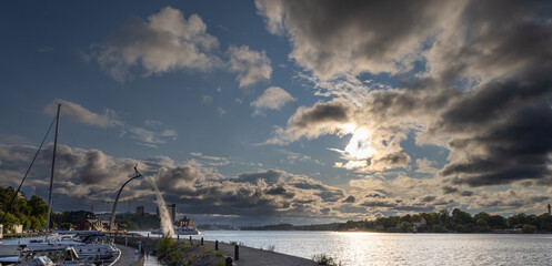 View to Stockholms downtown from Nacka Strand with dramatic clouds
