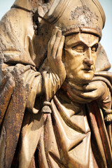 Sculptural Solemnity: Wooden Statue of a Bishop