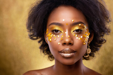  Artistic Close-Up Portrait of a Woman with Golden Flake Makeup