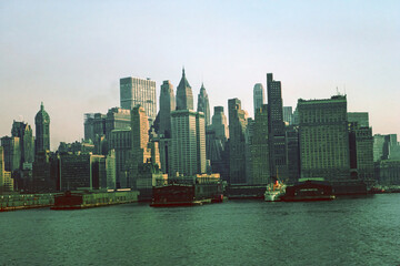 The skyline of New York City as seen from a ship in the state of New York in the United States of America in 1964