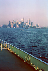 The skyline of New York City as seen from a ship in the state of New York in the United States of...