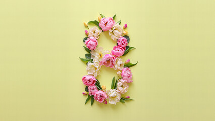 Number "8" made of peonies and tulips isolated on pastel yellow background. 8 march, international womans day concept