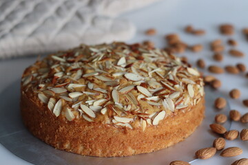 Almond buttermilk cake. A delicious cake adorned with a generous sprinkle of chopped almonds, perfect for tea time