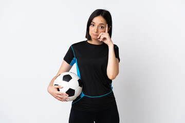 Young football player woman isolated on white background thinking an idea