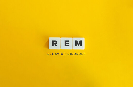 REM Behavior Disorder. Text on Block Letter Tiles on Flat Background. Minimalist Aesthetics.