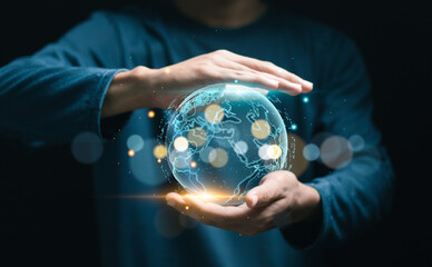 Big data analytics and business intelligence concept. Businessman holding global network connection and data exchanges over the world.