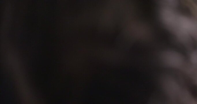 Hair Care. Woman receives a Procedure using the Darsonval device at home. Close-up of the Head. Concept of professional Cosmetology