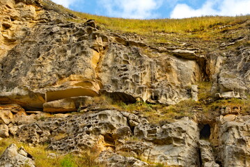 Russia, the North Caucasus. Fragments of steep cliffs with an unusual texture in the Chegem gorge.