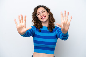 Young caucasian woman isolated on white background counting ten with fingers