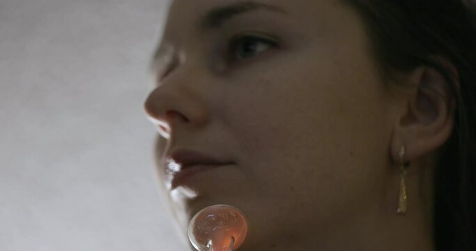 Skin Care. Woman receives a Procedure using the Darsonval device at home. Close-up of the Skin. Concept of professional Cosmetology