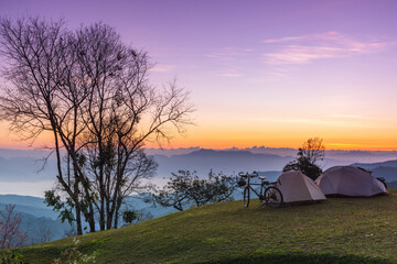 Fototapeta na wymiar Tourist tent on hight moutain at Doi Mae-ta-man, Chiang Mai Province, Thailand.