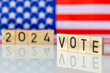 US elections 2024, American flag and the word VOTE 2024. The concept of voting in the United States...