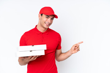 Pizza delivery caucasian man with work uniform picking up pizza boxes isolated on white background...