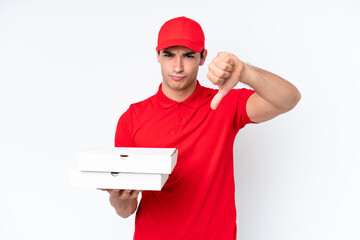 Pizza delivery caucasian man with work uniform picking up pizza boxes isolated on white background...