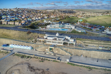 Aerial photo of the Saltdean art deco Lido and the WhiteCliffs Saltdean Cafe on the seafront in...