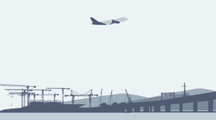 grey plane above industrial landscapes