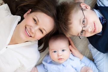 Happy mother with her children having fun