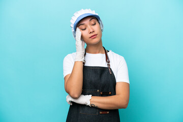 Fishwife Argentinian woman isolated on blue background with headache - obrazy, fototapety, plakaty
