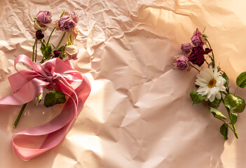 Concept shot of the background theme, wrapping paper, dried roses other flowers and other arrangements. Decoration