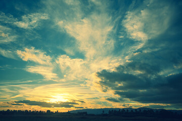 Colorful cloudy sky at sunset. Gradient color. Sky texture. Abstract nature background