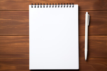 Open notepad with blank page and pen on clean desk. Ideal workspace for writing, studying, or office work