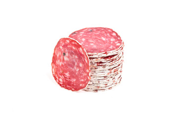 Slices of salami sausage on a white background