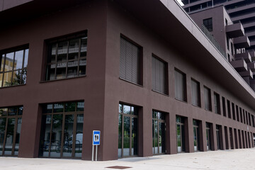Commercial premises with panoramic windows. Modern Brown facade.