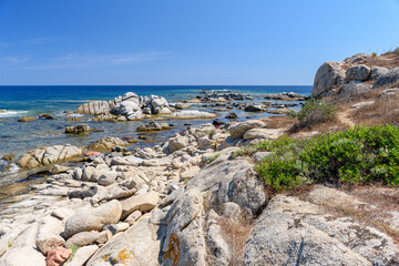 Fototapeta na wymiar The rocky coastline of Punta Niedda, near Arbatax in east Sardinia