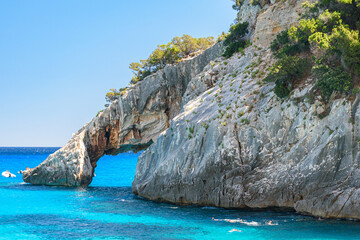 The rocky natural arch of Cala Goloritzè, in the Orosei gulf in east Sardinia