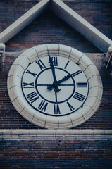 clock on the wall of a building