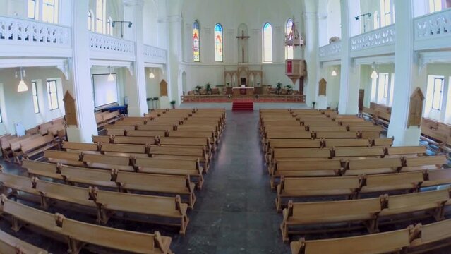 Wooden benches and sanctuary in Evangelical Lutheran Cathedral