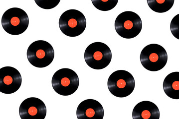 Pattern of Old black vinyl records isolated on white background. Black vinyl record - vintage music...