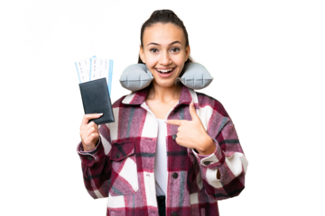 Young Traveler woman holding a passport over isolated chroma key background with surprise facial expression