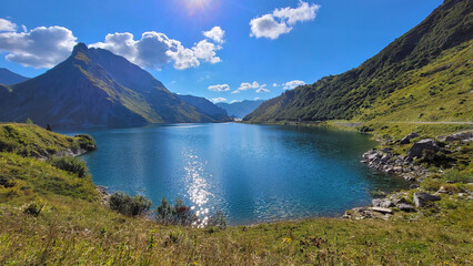 Fototapeta premium Picturesque Alpine Lake in Austria, Vorarlberg, Lech, water reflection