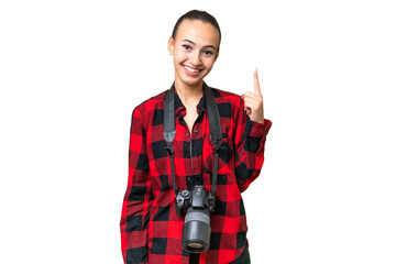 Young photographer Arab woman over isolated background pointing with the index finger a great idea