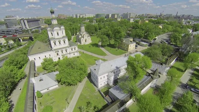 Spaso-Andronikov monastery against city with traffic 