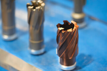 industrial drilling milling metal cutting tool with carbide cutter insert in workshop. Drills with...