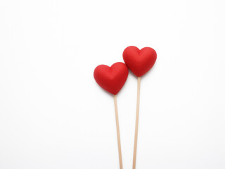 two red heart lollipops on white background for Valentines Day