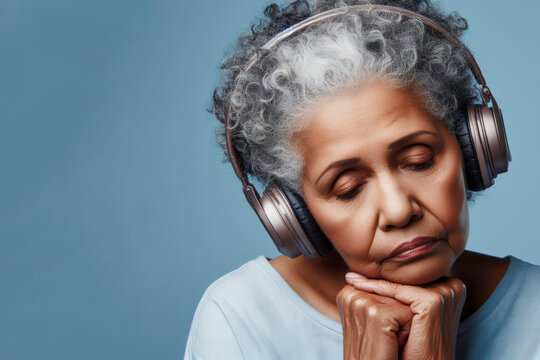Sad old african american woman with white beard and headphones isolated on a blue background. ai generative