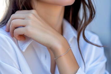 close-up of a woman wrist with a bracelet - obrazy, fototapety, plakaty