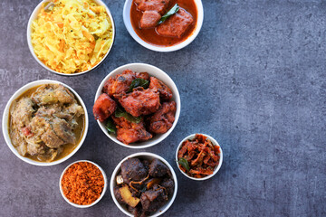 Kerala special food sadhya in banana leaf plate with Chicken fry Duck roast Beef fry Fish curry Cabbage thoran. Festival food for Christmas Easter celebration Kerala India Sri Lanka